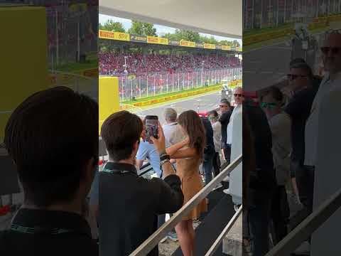 Crypto Guy Taking a Picture of His Girlfriend at The Formula 1 Race 😂